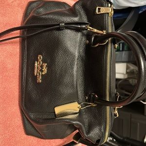 Black leather zippered coach handbag